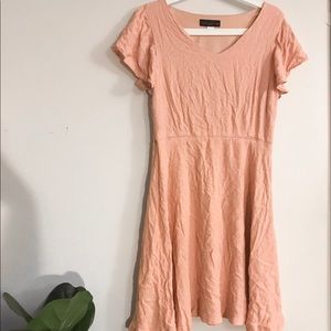 Pink dress with flutter sleeves
